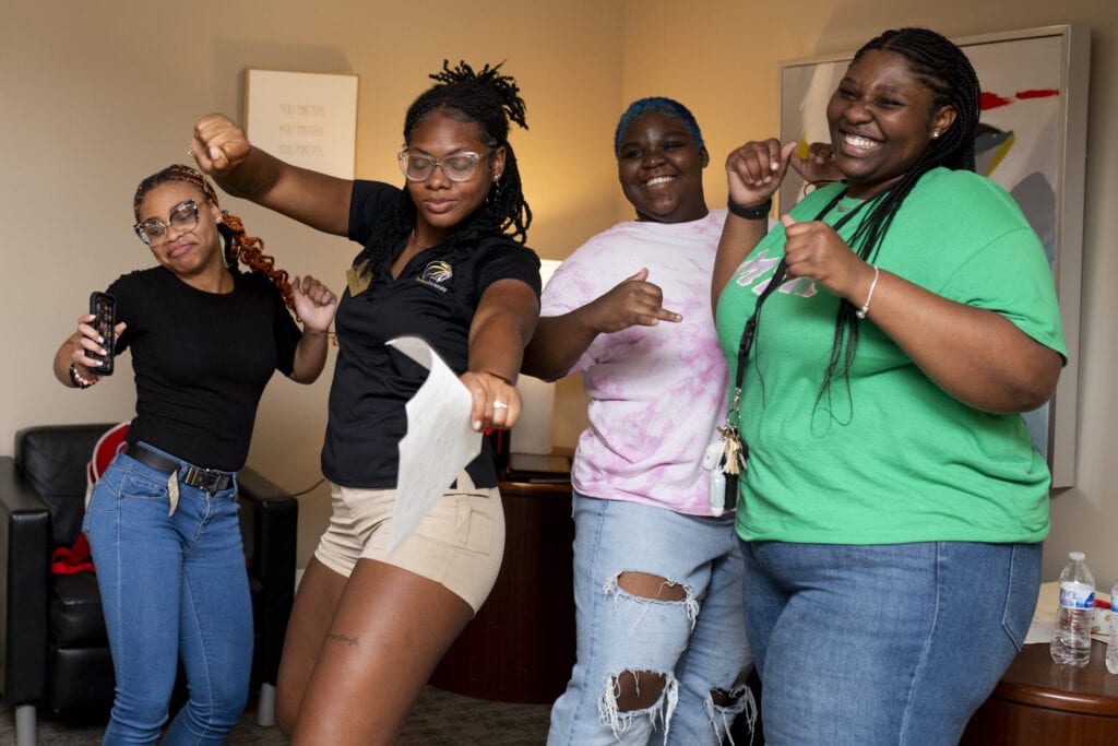 Resident Assistants cranked up the tunes and danced during move in.