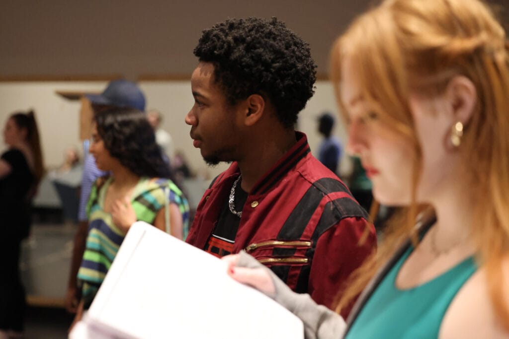 Jordan Ray, center, rehearses lines for Cinderella.