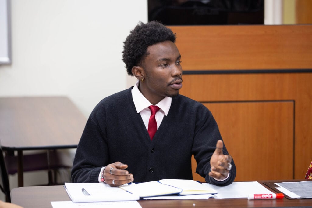 A male student participates in the mediation tournament