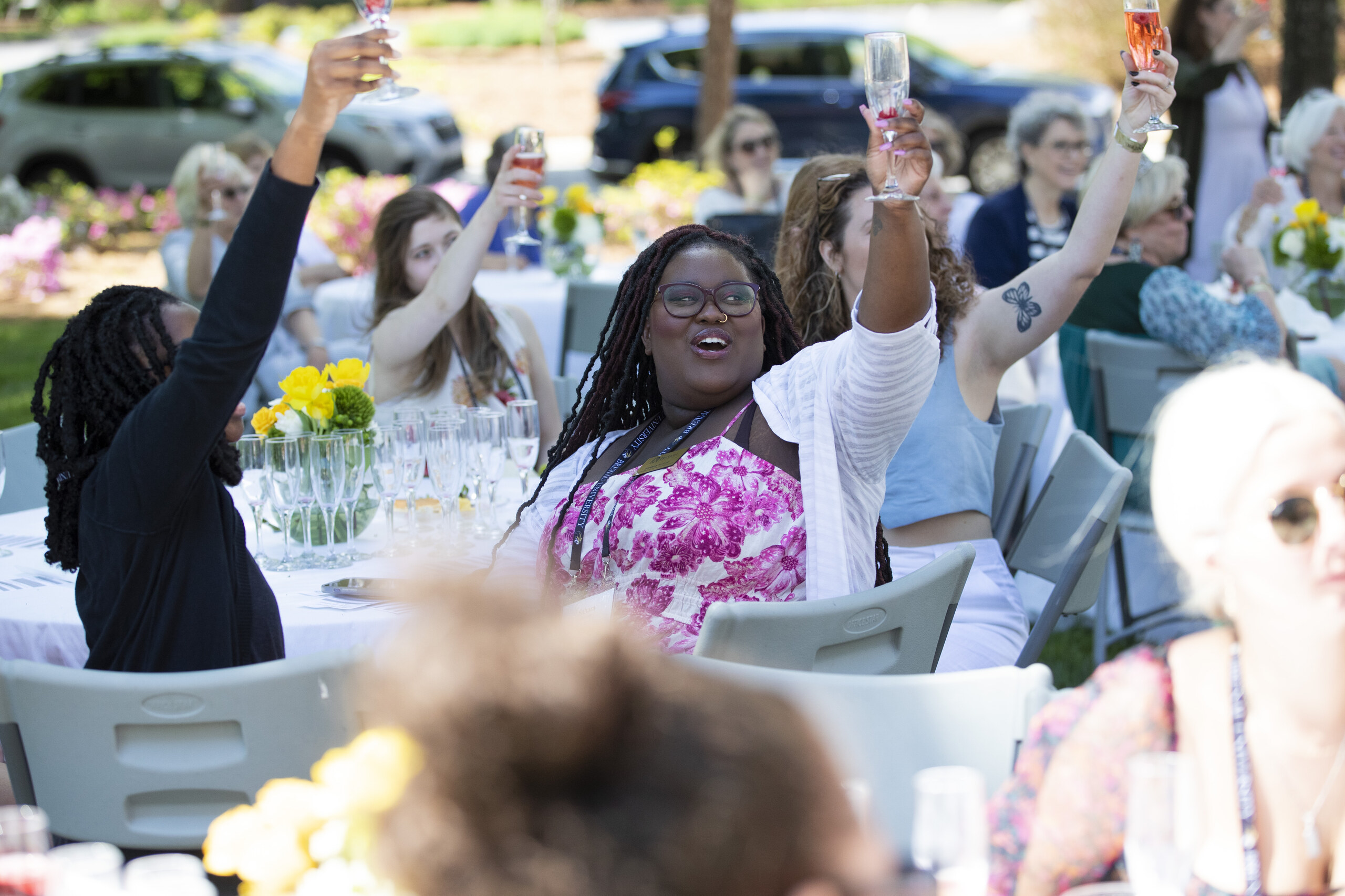 Alumni raise a glass at the champagne brunch at Alumni Reunion Weekend