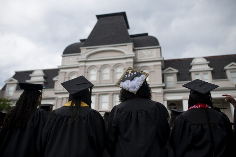 Graduates in front of Pearce Auditorium for the 145th commencement