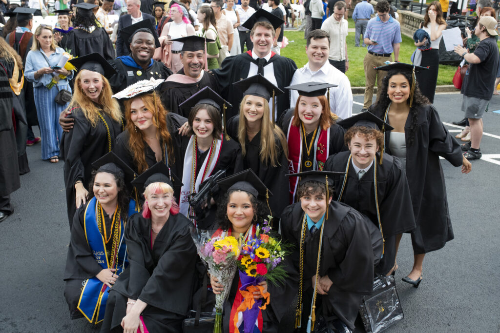 Theatre students gather for a photo after graduation