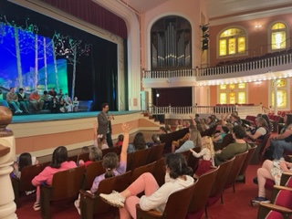 Girl Scouts learn about theatre.