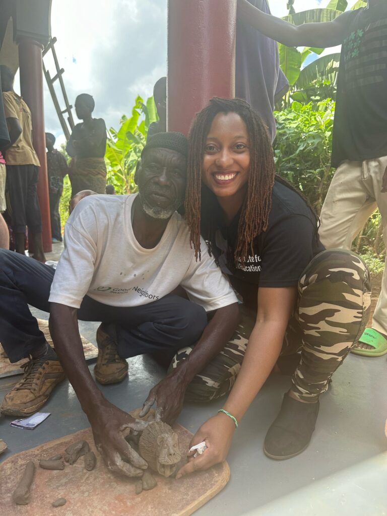 A student with a Rwandan man