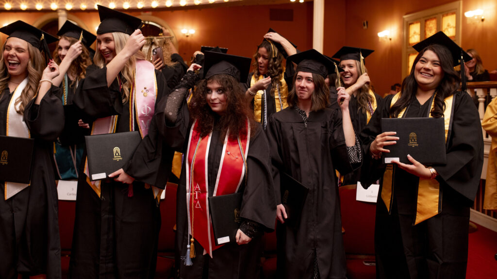 The undergraduates turn their tassels