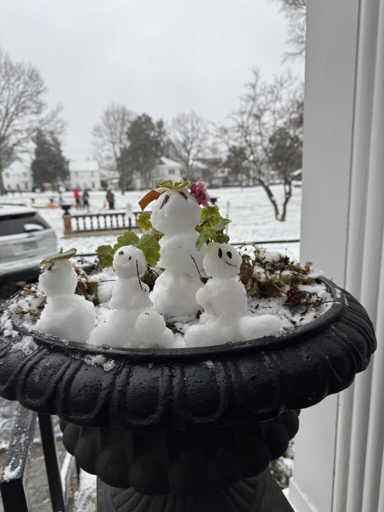 little snowmen made in a planter