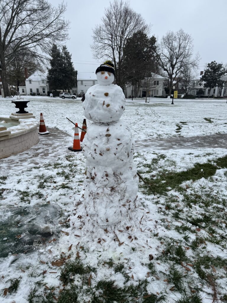 a snowman built by students during the winter weather