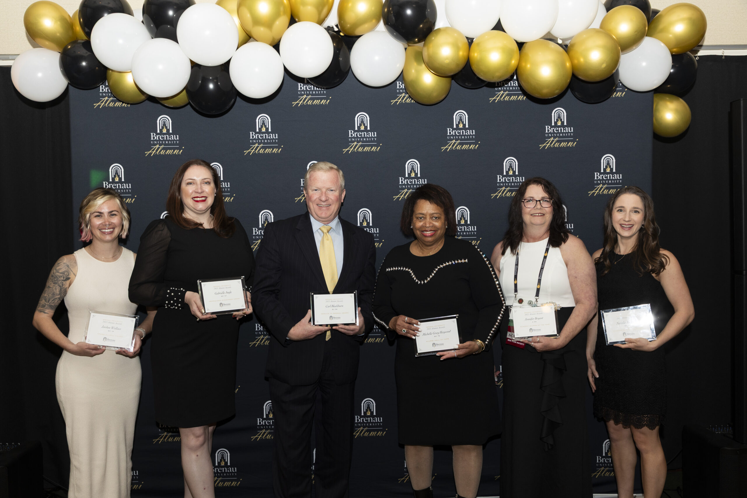 Alumni holding Awards
