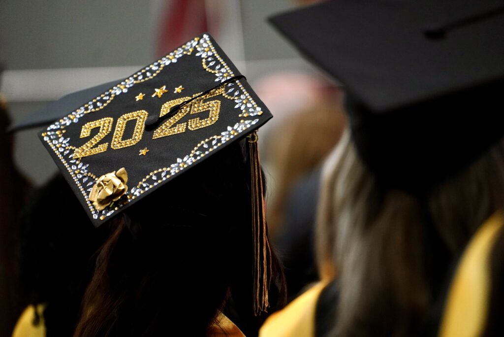 a sparkly cap with 2025 on it