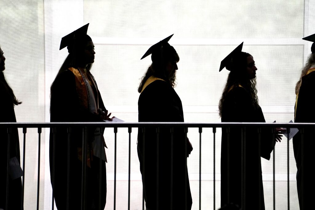 students line up at commencement