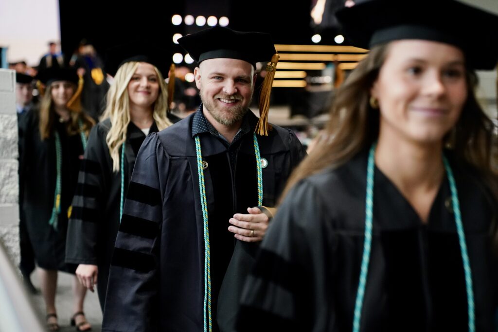 doctorate students process into the chapel