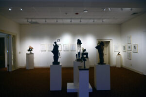 Exhibit of scuplture and prints in art gallery
