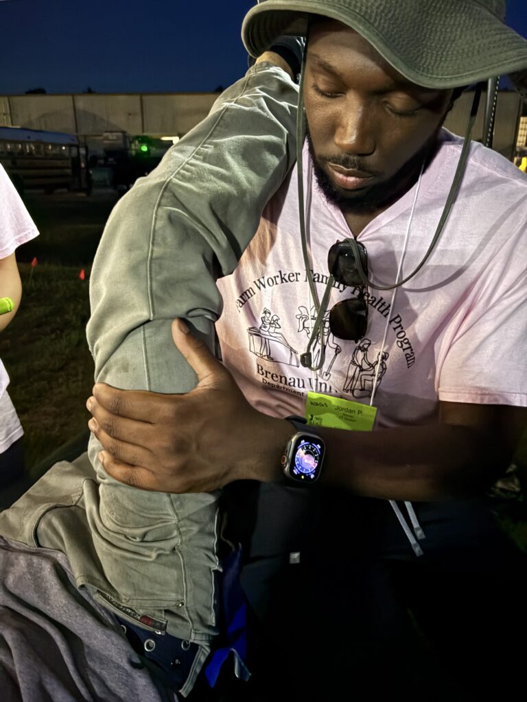 PT student  performs exercise for patient
