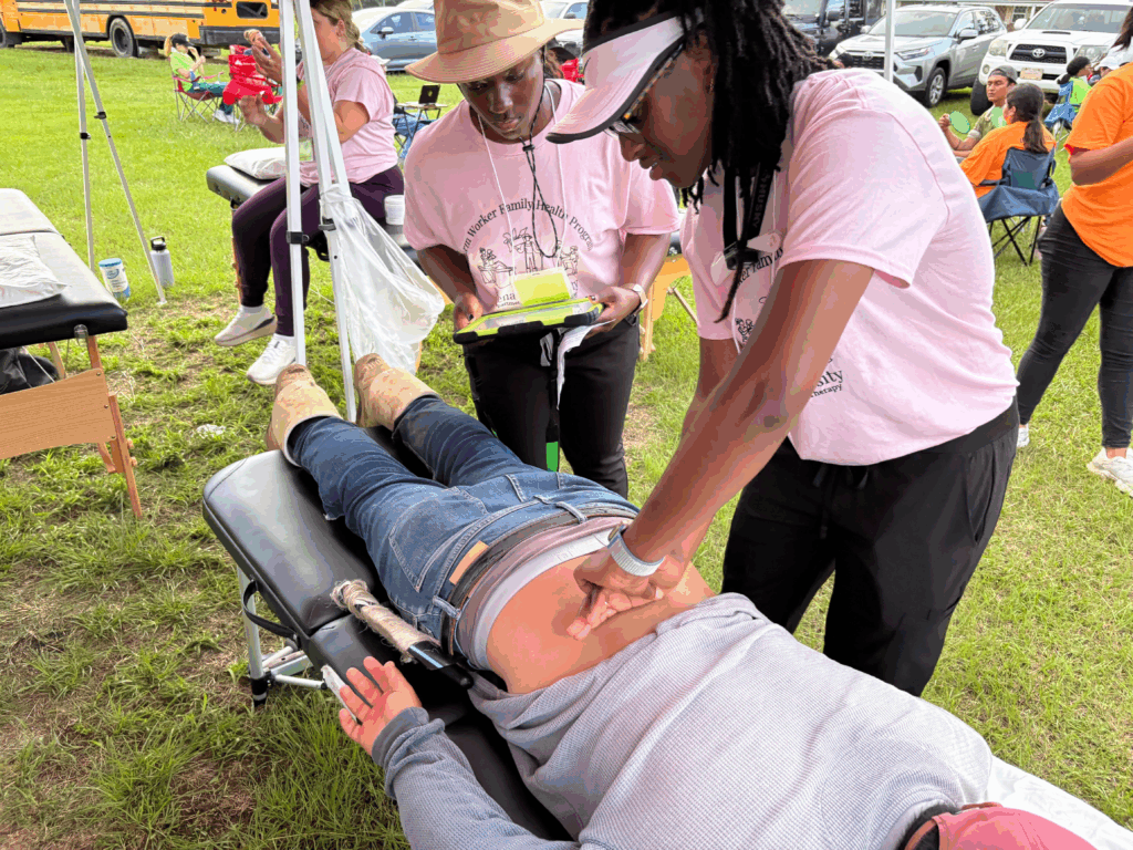 Two PT students provide services to a farm worker