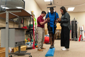 PT students use tools in the clinic to model patient exercises