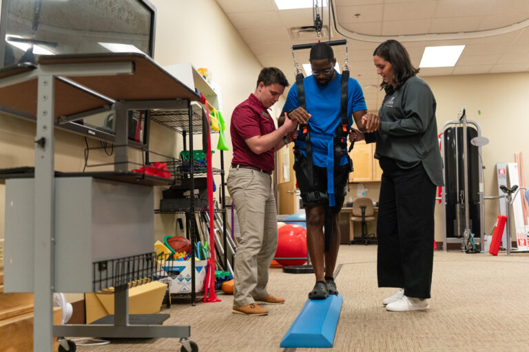 PT students use tools in the clinic to model patient exercises