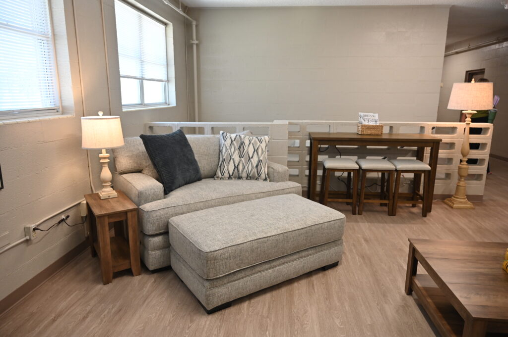 A double sized chair and tech counter in the West hall lounge