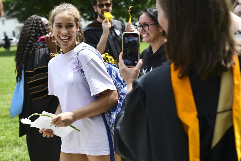 a student walks down the front path
