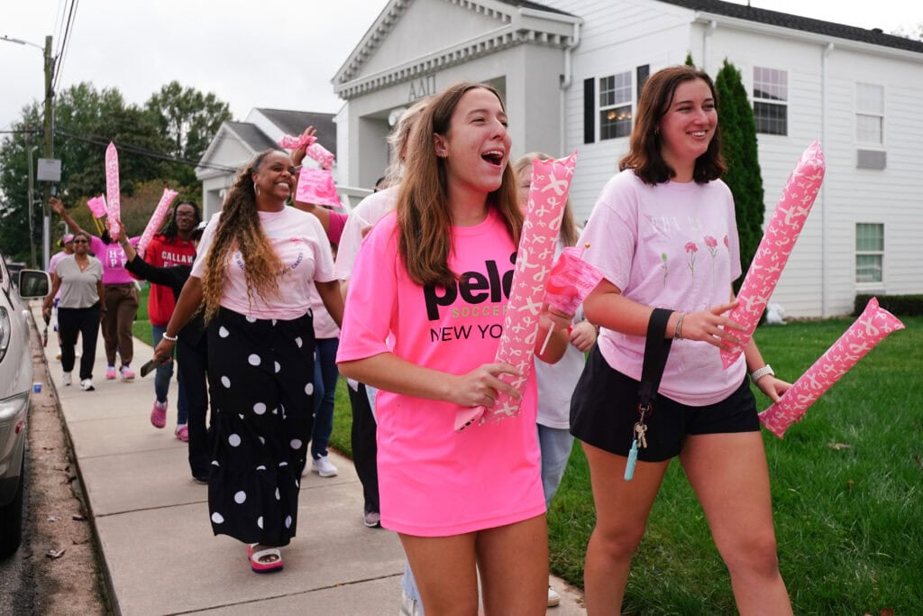 sorority members from other chapters in pink