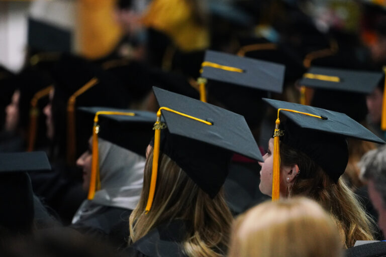 graduates in mortarboard hats