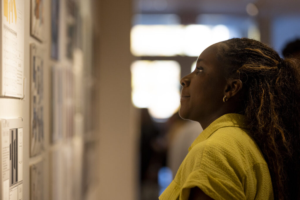 a person views a piece of art