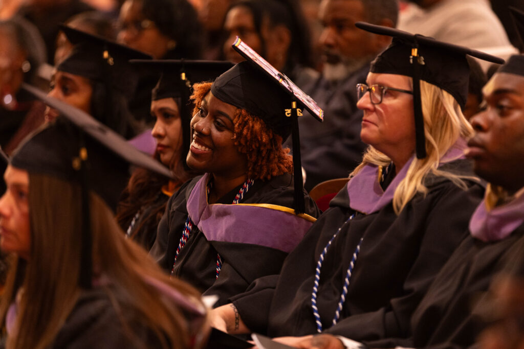 masters degree graduates in the crowd