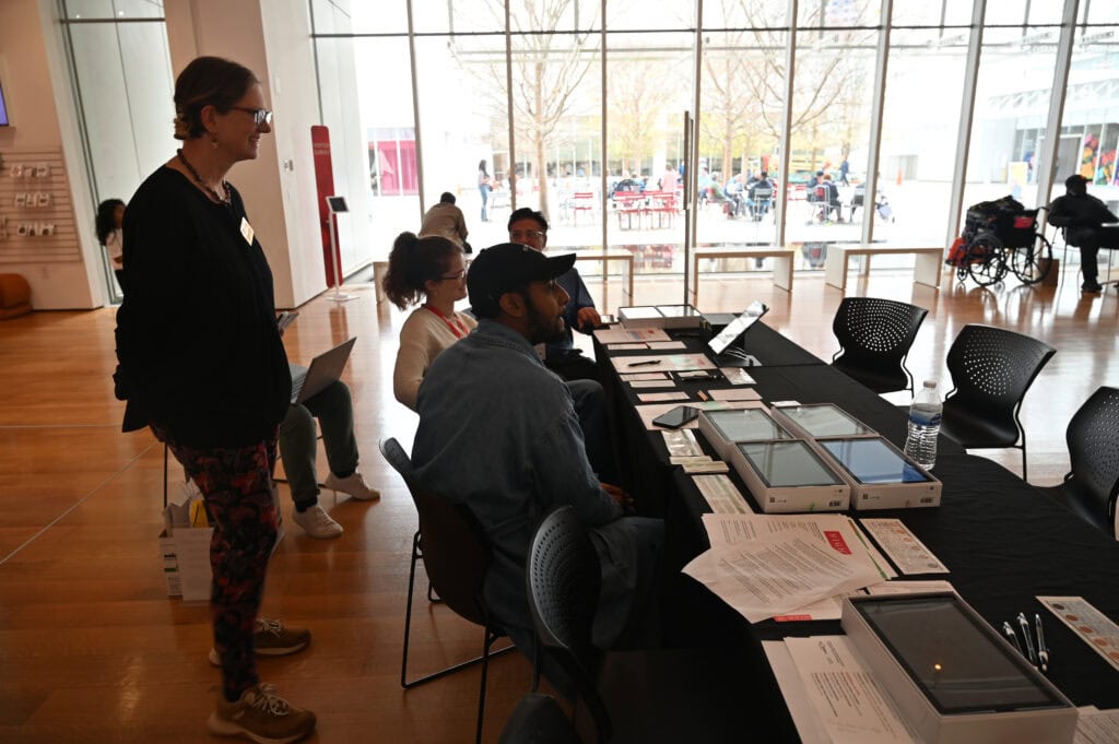 Students engaging at Brenau University admissions event, showcasing campus life and academic programs.