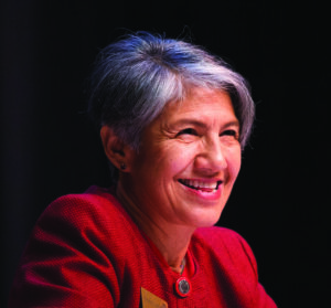 Professor M. Irma Alvarado smiling.