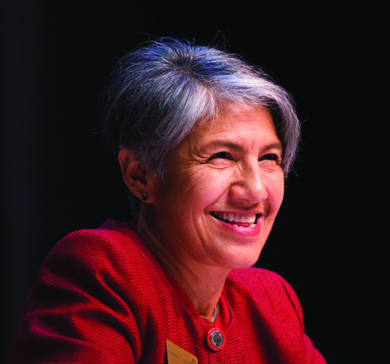 Professor M. Irma Alvarado smiling.