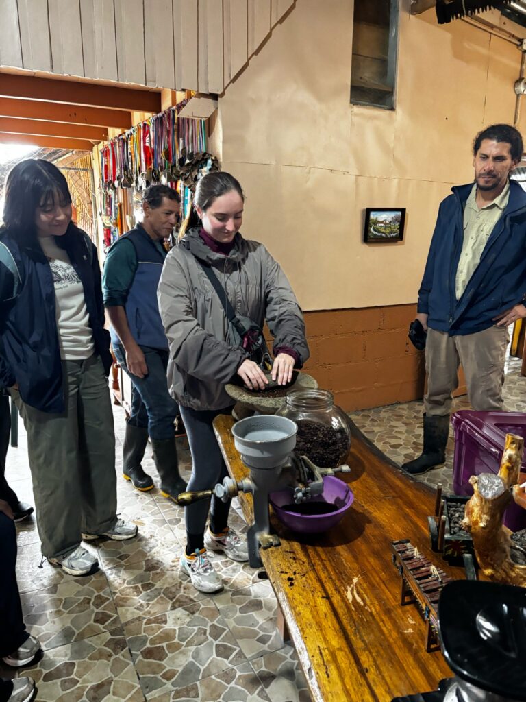 student makes coffee with beans