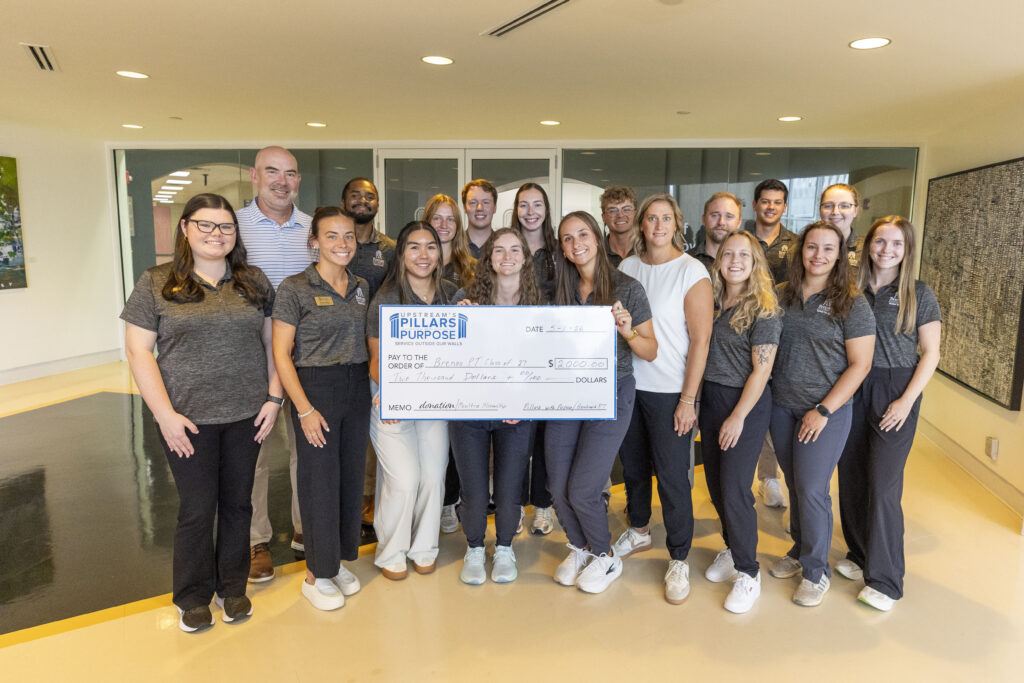 PT students with check