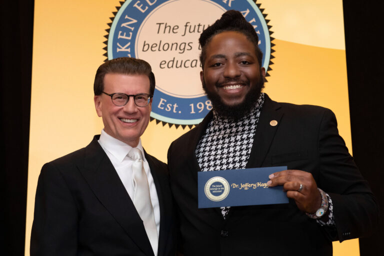 Jeffrey Heggs with award