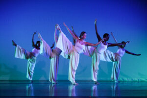Brenau Dance students on stage during a performance.